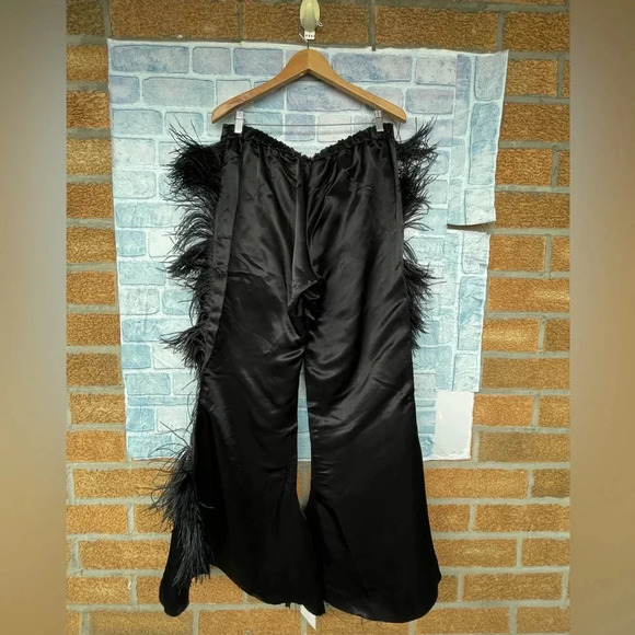MARQUES' ALMEIDA
Feather-embellished kick-flare satin trousers size 10 - Picture 10 of 16
